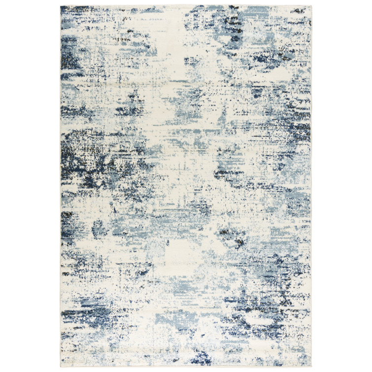 Ivory and Blue Abstract Synthetic Rectangular Area Rug 5'2"x7'3"