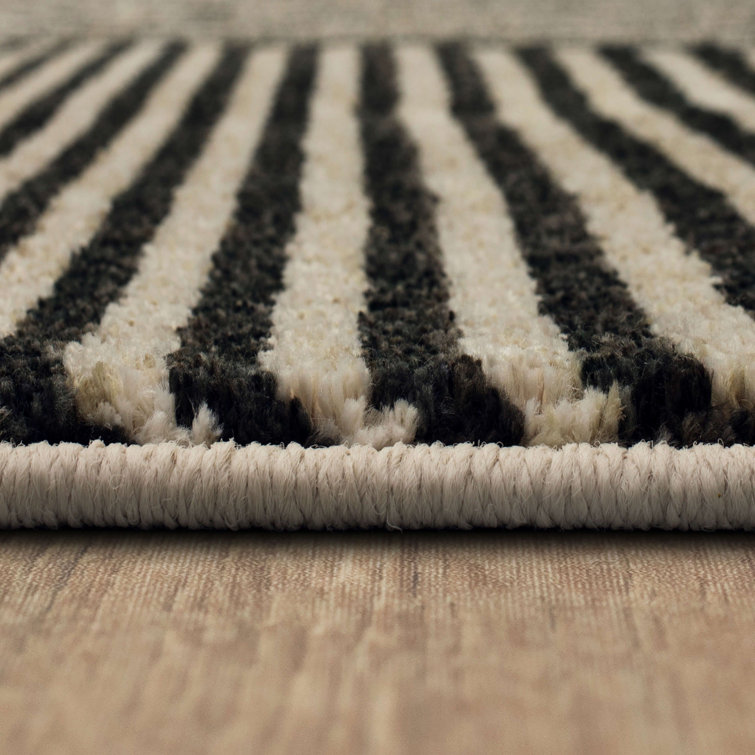 Linea Black Geometric Polyester 28''x94'' Area Rug