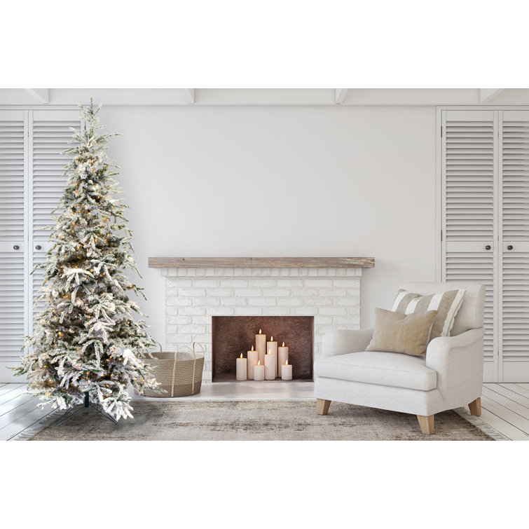 12-Foot Flocked Pine Artificial Christmas Tree with Warm White LED Lights