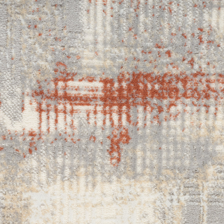 Ivory and Rust Abstract Synthetic 5' x 7' Area Rug