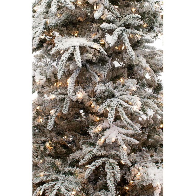12-Foot Flocked Pine Artificial Christmas Tree with Warm White LED Lights