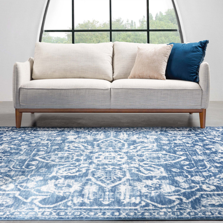 Light Blue Floral Synthetic Reversible 5' x 7' Rug