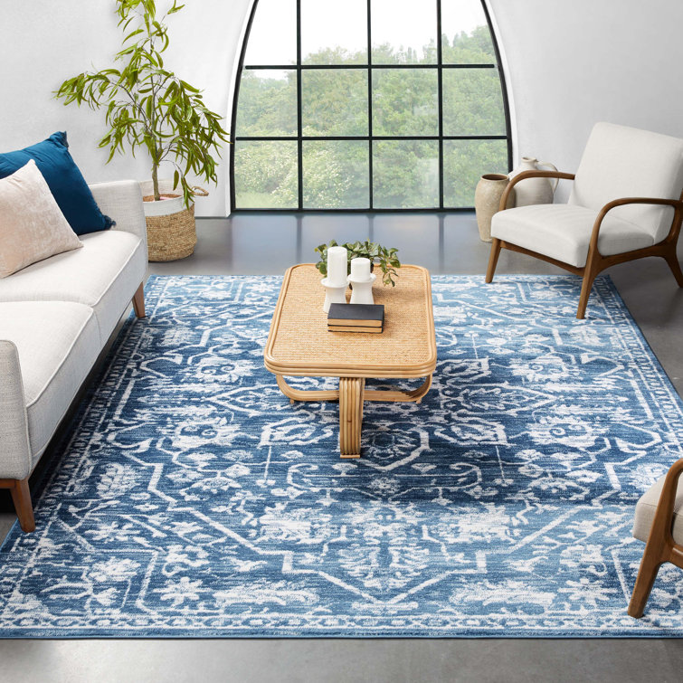 Light Blue Floral Synthetic Reversible 5' x 7' Rug
