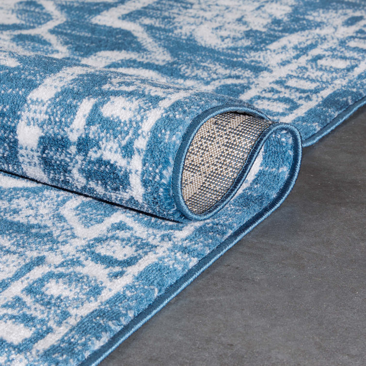 Light Blue Floral Synthetic Reversible 5' x 7' Rug