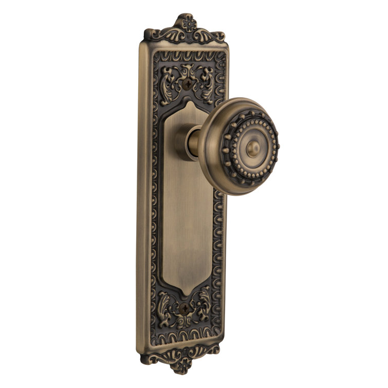 Antique Brass Egg & Dart Plate with Meadows Door Knob