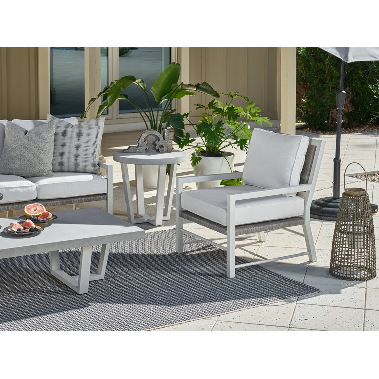Cream Coastal Lounge Chair with Cushions and Wicker Detailing