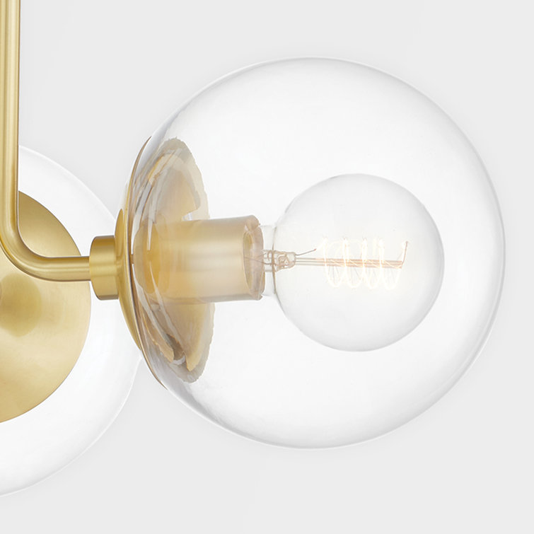 Meadow Transitional 3-Light Semi-Flush Mount in Aged Brass with Clear Globe Shades