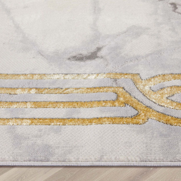Ivory Abstract Easy-Care Stain-Resistant Synthetic Area Rug 5' x 7'