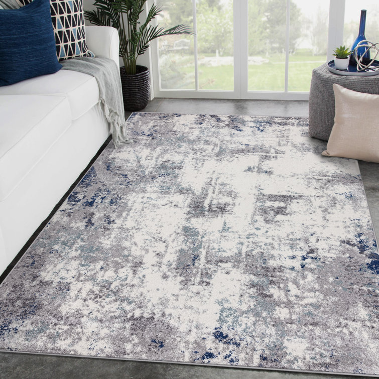Ivory and Gray Abstract Synthetic Area Rug 4' x 5'