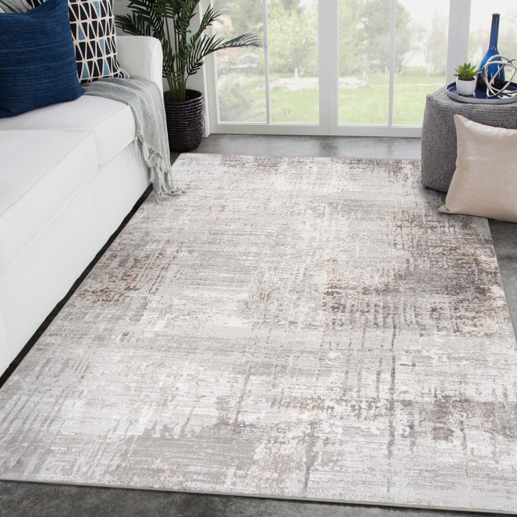 Beige Abstract 6' x 9' Synthetic Area Rug
