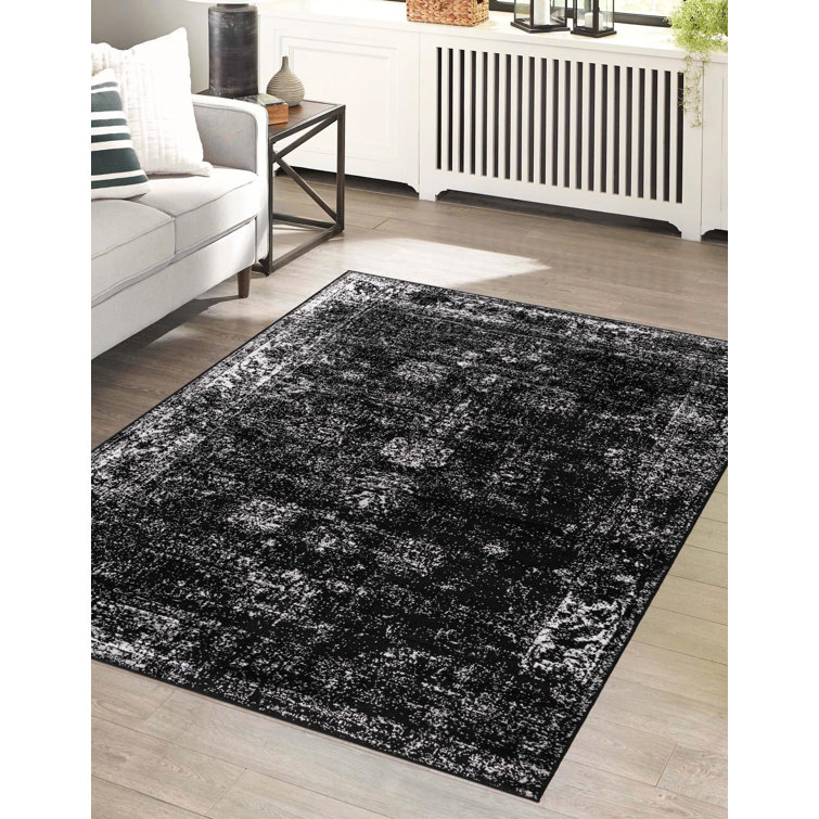 Brandt Black Floral Synthetic Octagon Area Rug