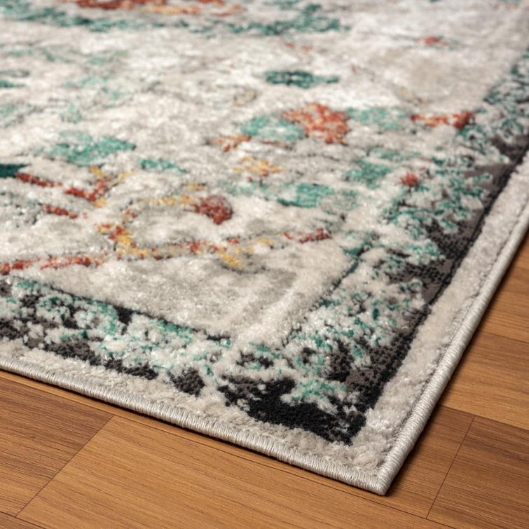 Green Floral Distressed 8' x 10' Synthetic Area Rug