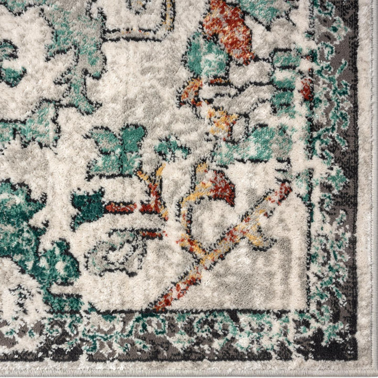 Green Floral Distressed 8' x 10' Synthetic Area Rug