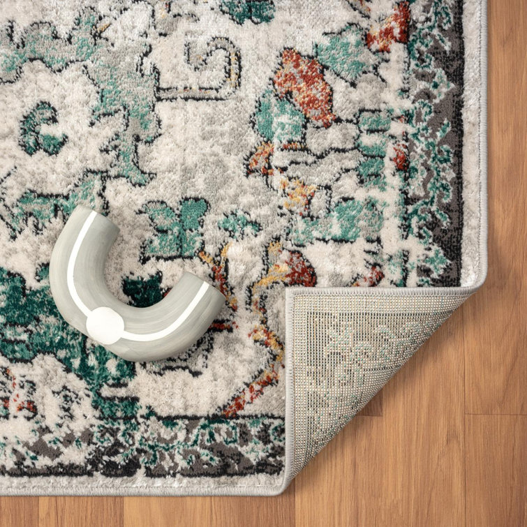 Green Floral Distressed 8' x 10' Synthetic Area Rug