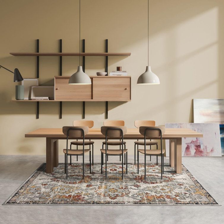 Distressed Orange and Beige Floral 6' x 9' Synthetic Area Rug