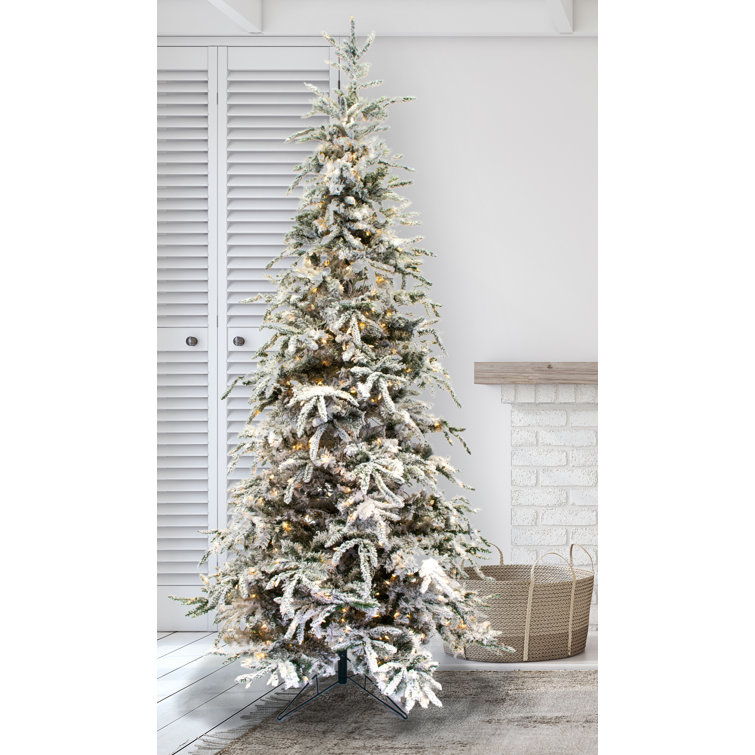 12-Foot Flocked Pine Artificial Christmas Tree with Warm White LED Lights