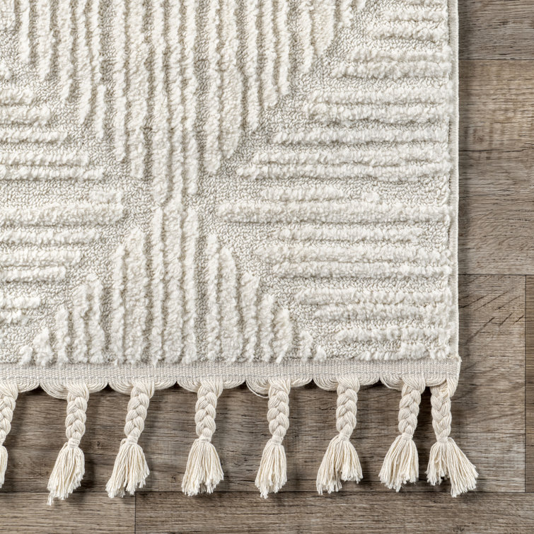 Cream Geometric Tasseled 4' x 6' Synthetic Area Rug