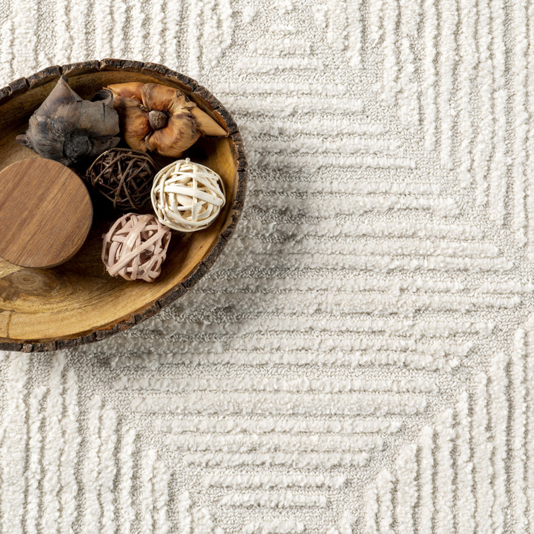 Cream Geometric Tasseled 4' x 6' Synthetic Area Rug