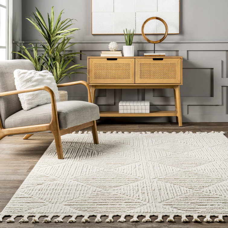 Cream Geometric Tasseled 4' x 6' Synthetic Area Rug