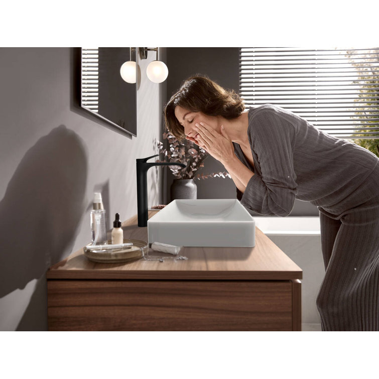 Elegantly Curved Matte Black Brass Vessel Faucet with Waterfall Stream