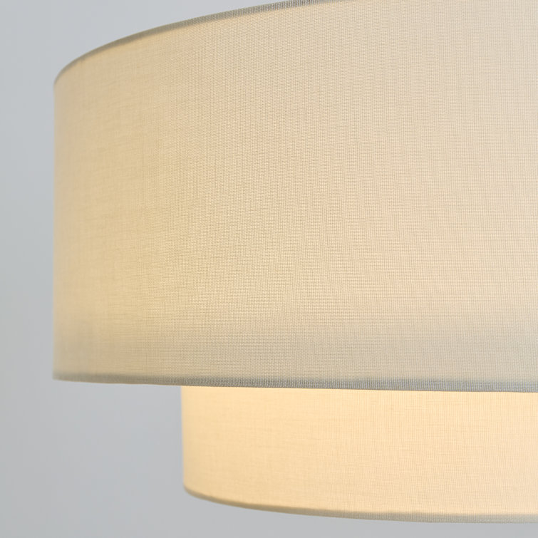 Sawyer Adjustable Double Tiered Arc Floor Lamp in Burnished Brass