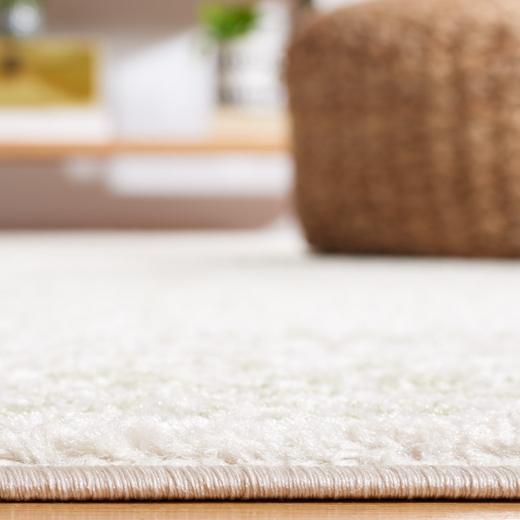 Ivory and Sage 4' x 6' Synthetic Rectangular Area Rug