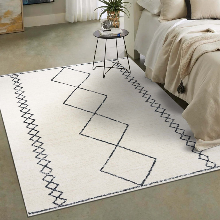 Cream Geometric Synthetic 8' x 10' Area Rug