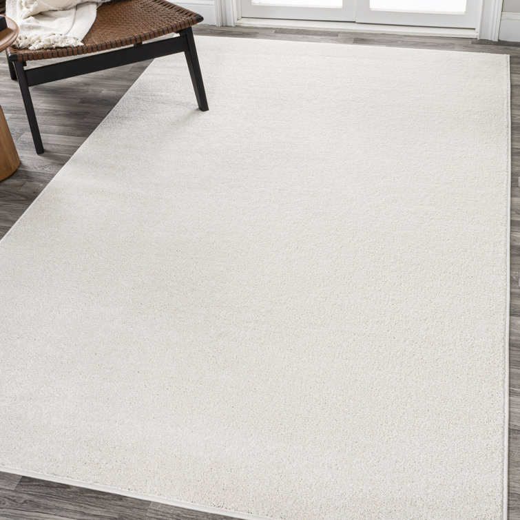 Cream Solid Color Machine Woven Polypropylene Area Rug