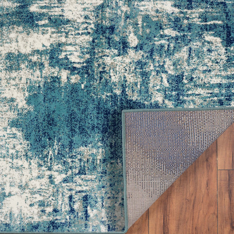 Light Blue Abstract 8' x 10' Stain-Resistant Synthetic Rug