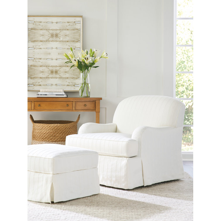 White Slipcovered Swivel Armchair with Manufactured Wood Frame