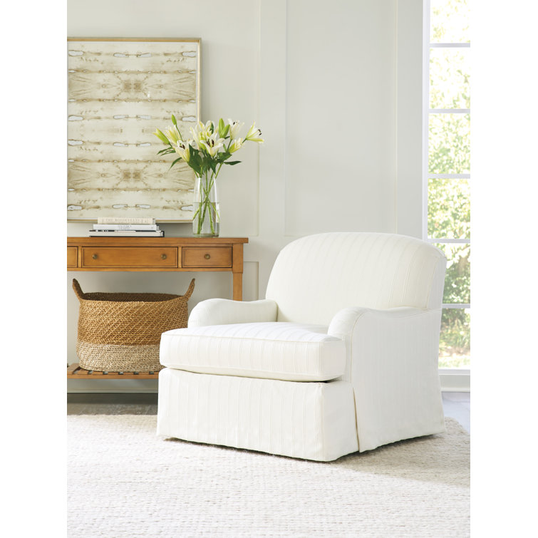 White Slipcovered Swivel Armchair with Manufactured Wood Frame