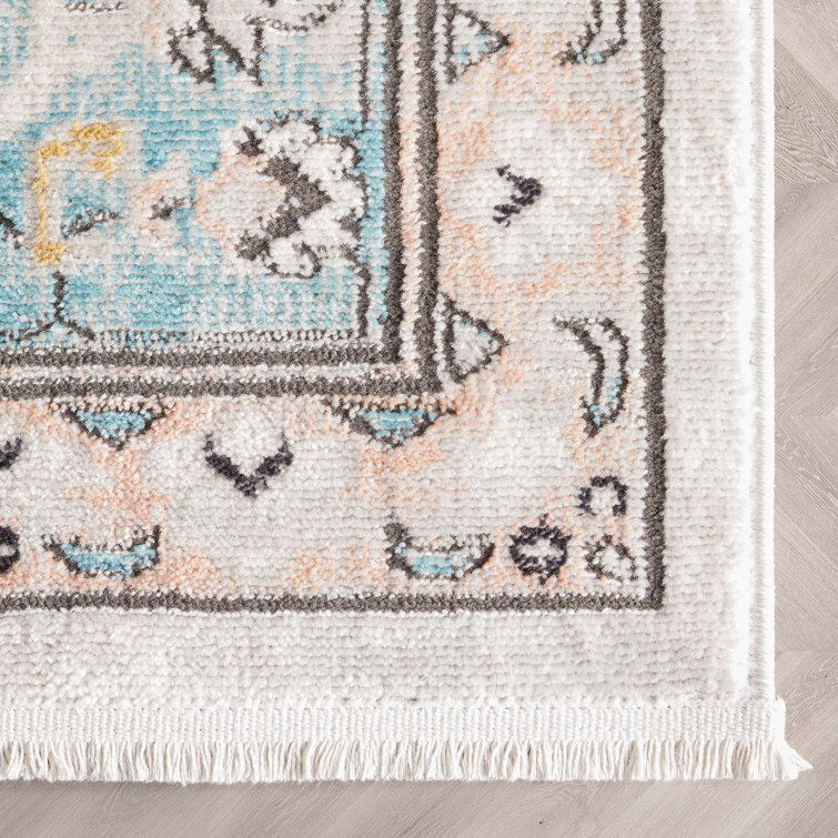 Indira Blue and Ivory Rectangular Synthetic Area Rug 4' x 6'