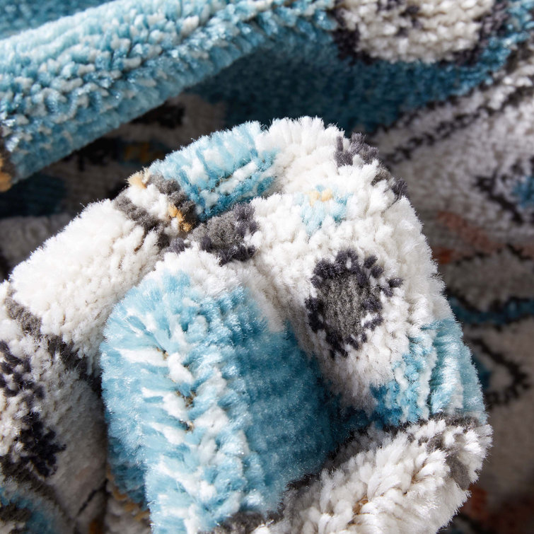 Indira Blue and Ivory Rectangular Synthetic Area Rug 4' x 6'