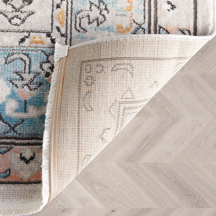 Indira Blue and Ivory Rectangular Synthetic Area Rug 4' x 6'