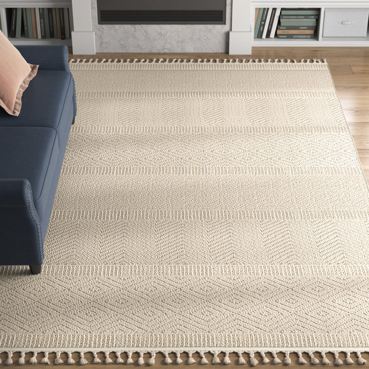 Ivory Geometric Braided 9' x 12' Synthetic Area Rug