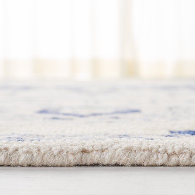 Handmade Ivory and Navy Wool 4' x 6' Oriental Rug