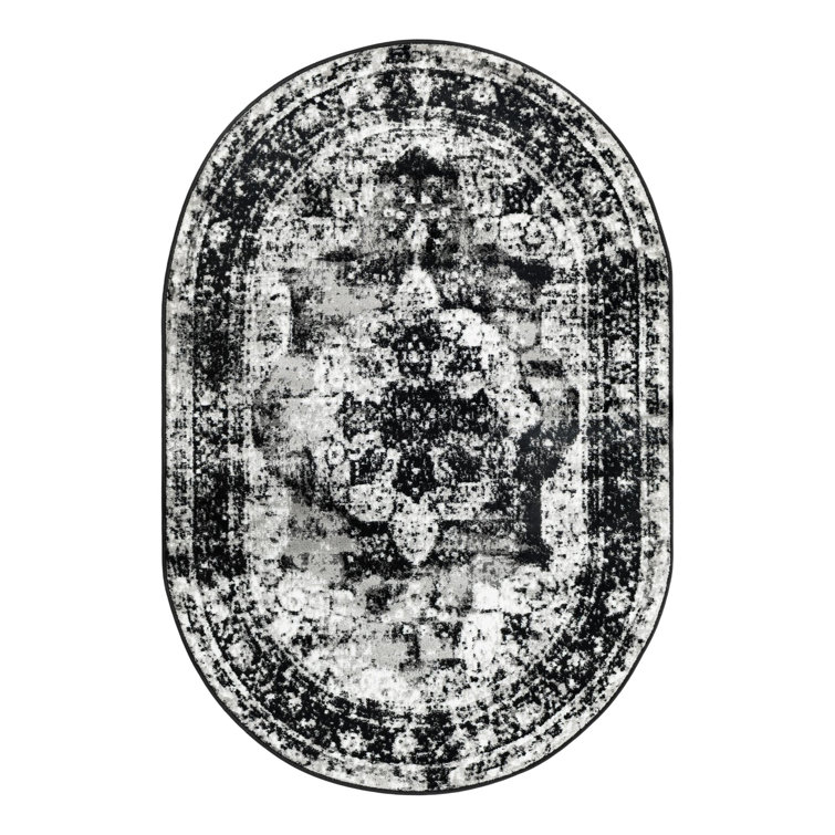 Oval 9' x 12' Black and Brown Synthetic Oriental Rug