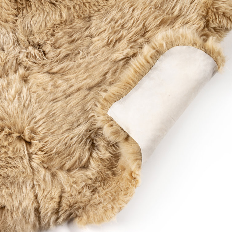 Hand-Knotted Beige Sheepskin Round Cowhide Rug
