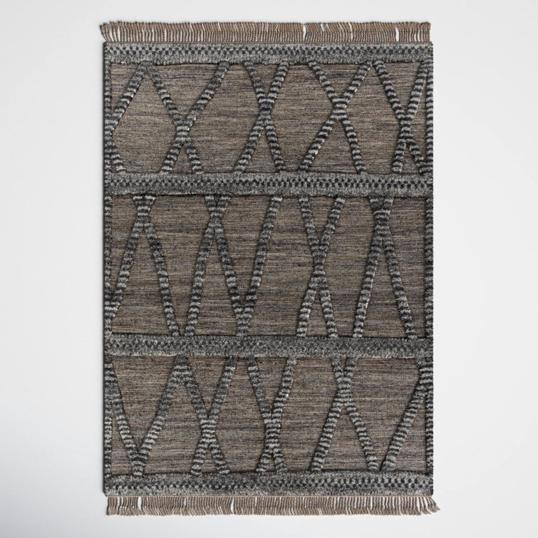 Handmade Black Wool 5' x 7'6" Rectangular Rug with Tassels