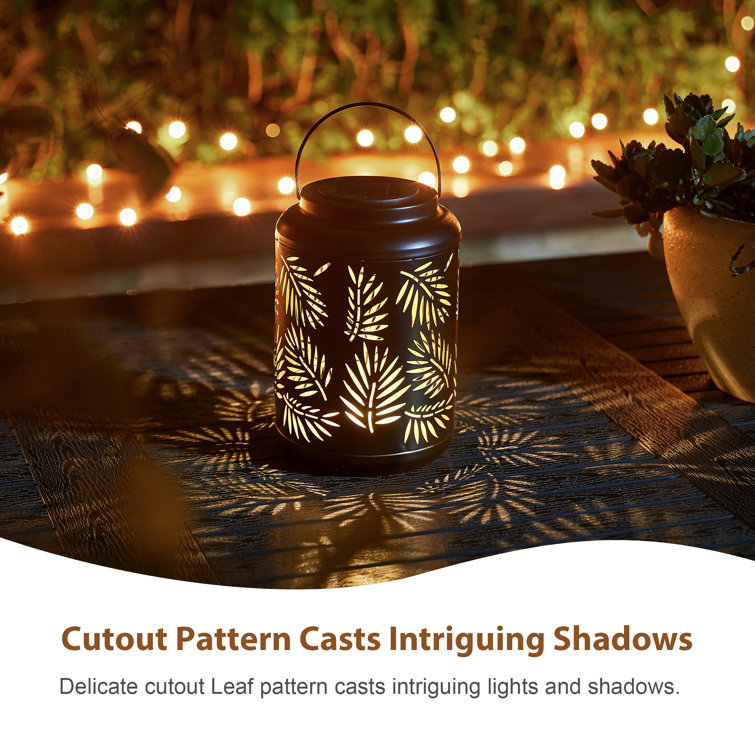 Black Metal Cylinder Solar Powered Outdoor Lantern with Leaf Cutouts