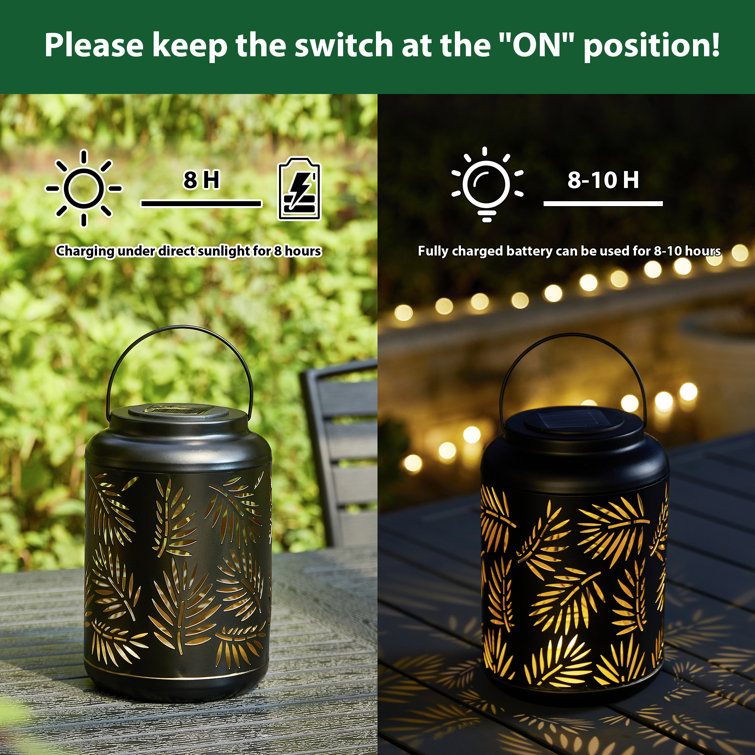 Black Metal Cylinder Solar Powered Outdoor Lantern with Leaf Cutouts