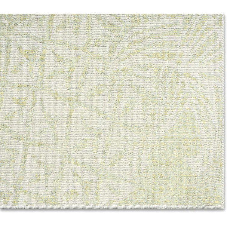 Green and Ivory 5' x 7' Synthetic Rectangular Indoor/Outdoor Area Rug