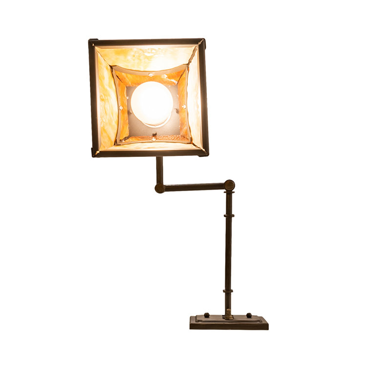 Antique Brass Swing Arm Sconce with Amber Glass Shade