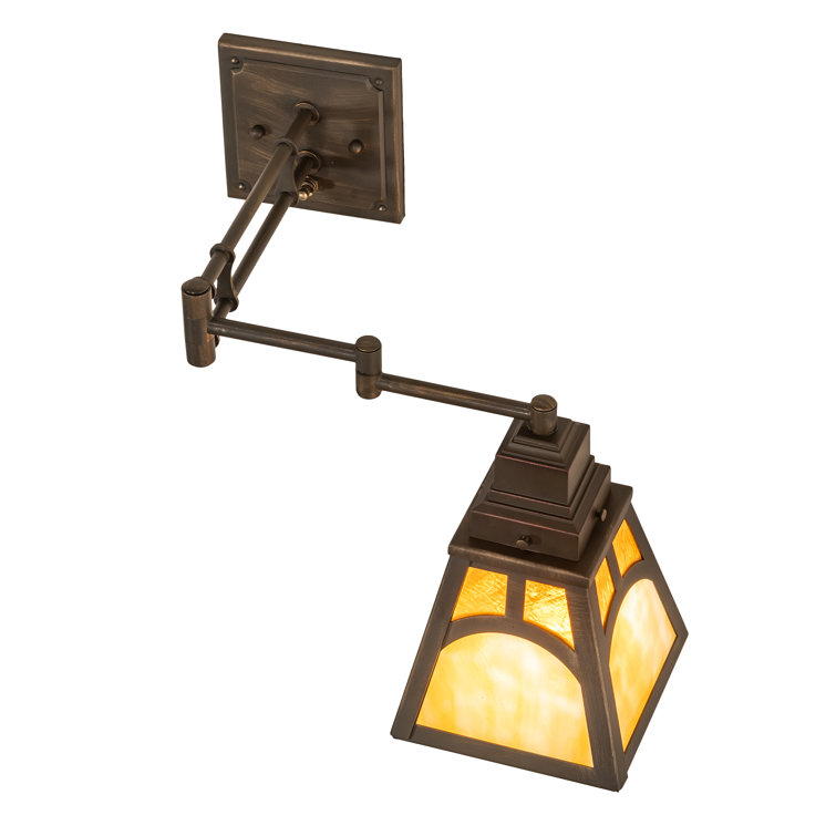 Antique Brass Swing Arm Sconce with Amber Glass Shade