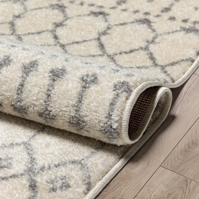 Ivory Grey Synthetic 5'3" x 7'3" Rectangular Easy-Care Area Rug