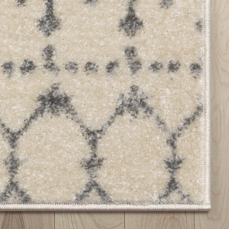Ivory Grey Synthetic 5'3" x 7'3" Rectangular Easy-Care Area Rug
