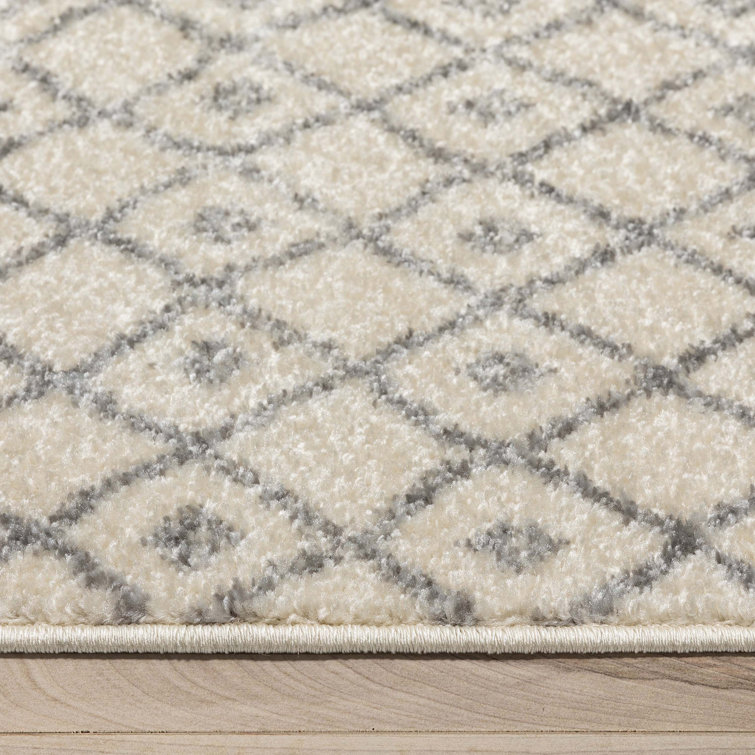 Ivory Grey Synthetic 5'3" x 7'3" Rectangular Easy-Care Area Rug