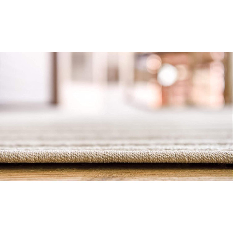 Beige Geometric 5' x 8' Synthetic Outdoor Area Rug