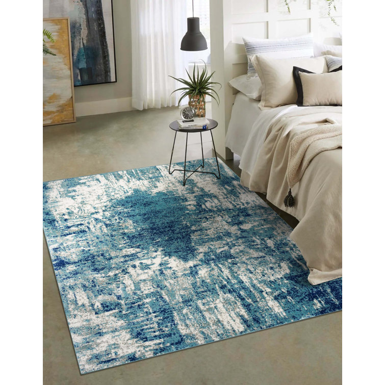 Light Blue Abstract 8' x 10' Stain-Resistant Synthetic Rug
