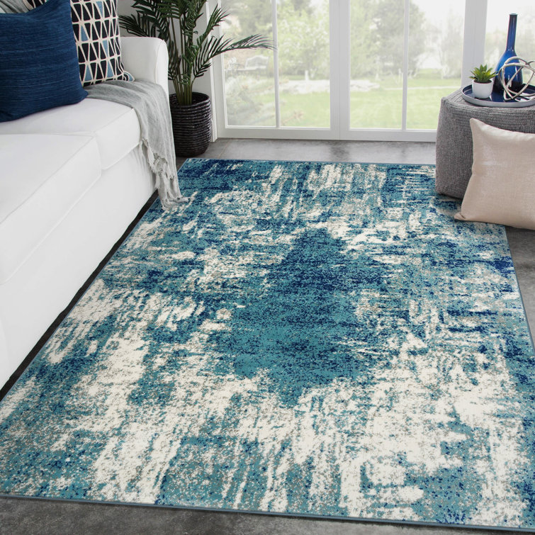 Light Blue Abstract 8' x 10' Stain-Resistant Synthetic Rug